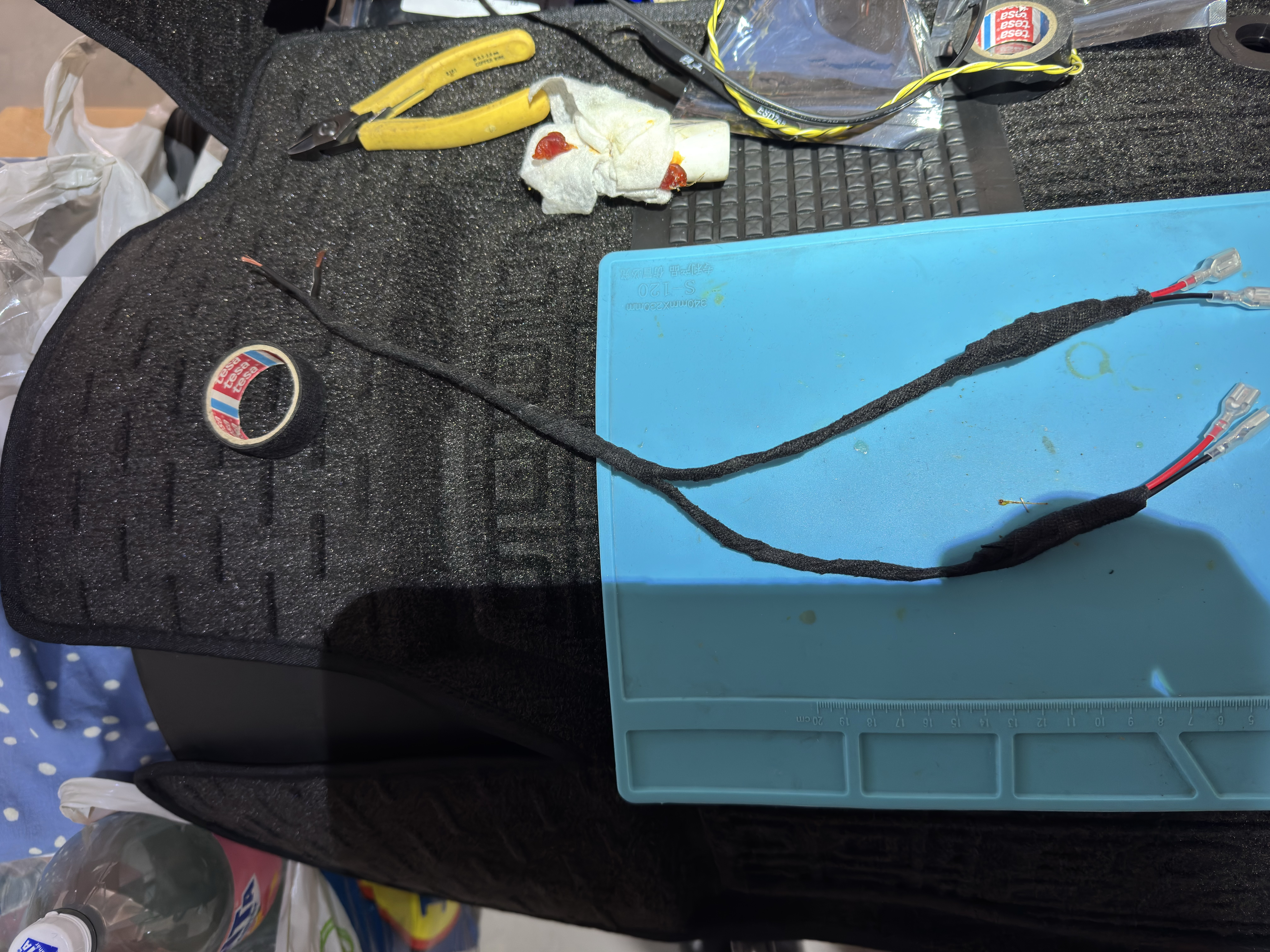 Use heat shrink tubing to insulate the solder joints. After shrinking wrap
wires with fabric tape