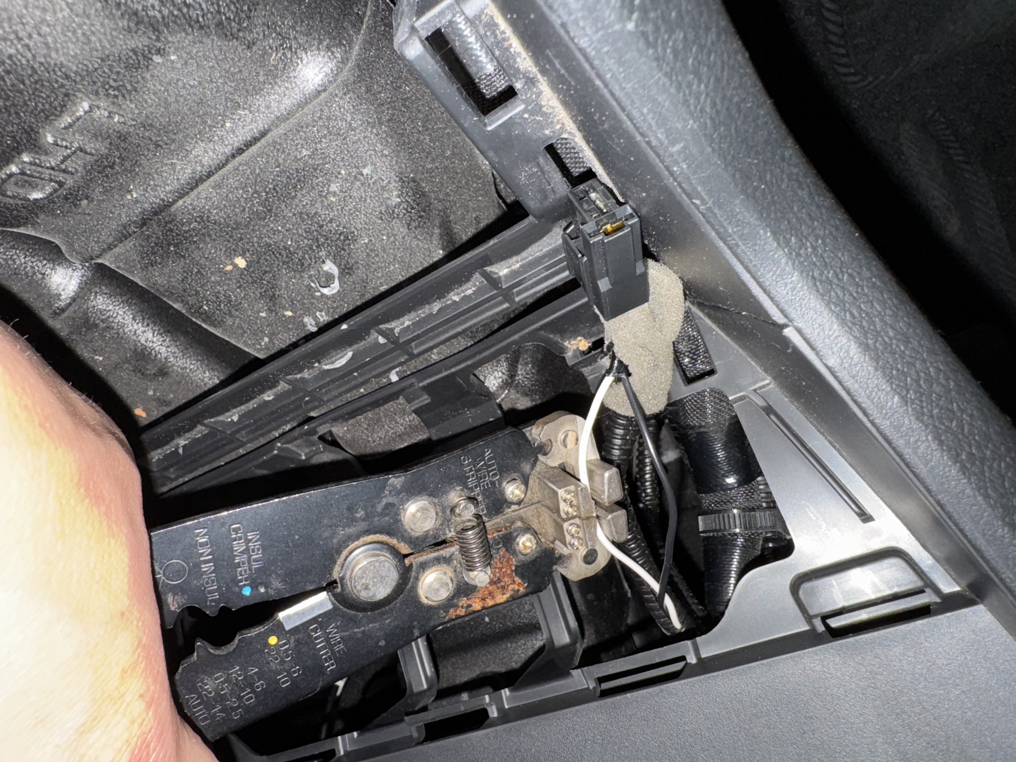 Remove part of the insulation after the connector that powers stock cigarette
lighter.